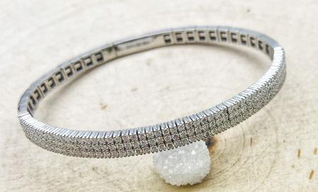 14 karat white gold flexible lab grown diamond bangle totaling 1.70 carats. $4100.00