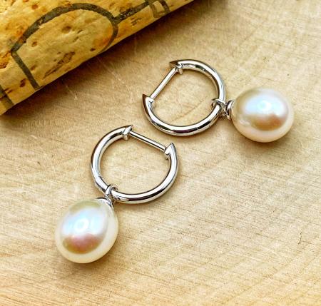Sterling silver and freshwater cultured pearl earrings. $165.00