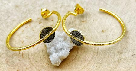 Sterling silver, 18 karat gold vermeil and ruthenium hoop earrings. $220.00