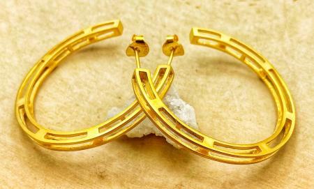 Sterling silver and 14 karat vermeil "Track" hoops. $285.00