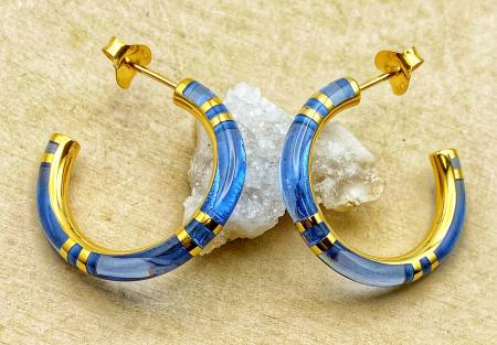 Sterling silver and 14 karat vermeil blue resin hoops. $285.00