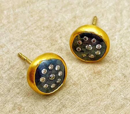 22 karat yellow gold and oxidized sterling silver 8mm diamond stud earrings. $820.00