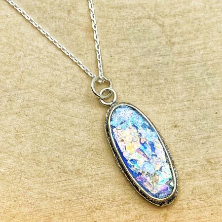 Sterling silver oval Roman glass necklace. $150.00