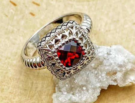 Sterling silver checkerboard cut garnet ring. $150.00