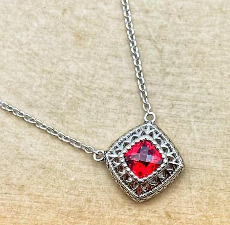 Sterling silver checkerboard cut garnet necklace. $250.00