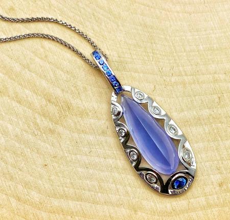 18 karat white gold custom cut blue chalcedony, diamond and blue sapphire necklace. $3400.00  **SOLD***