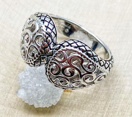 Sterling silver open swirl design ring. $125.00