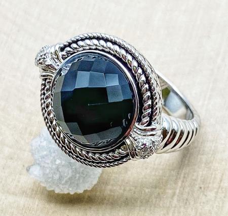 Sterling silver ring with a 12mm rose cut black onyx and diamond accents. $300.00