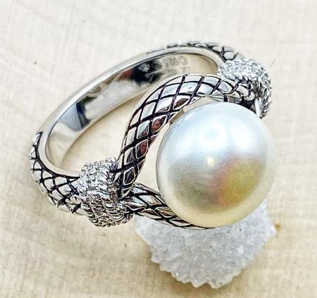 Sterling silver ring with a 10mm freshwater cultured pearl and diamond accents. $225.00