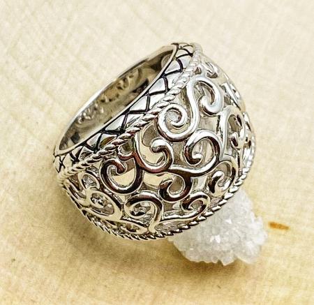 Sterling silver 18mm wide open swirl design ring. $150.00
