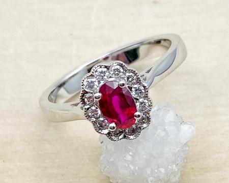 14 karat white gold ruby and diamond ring. $2295.00