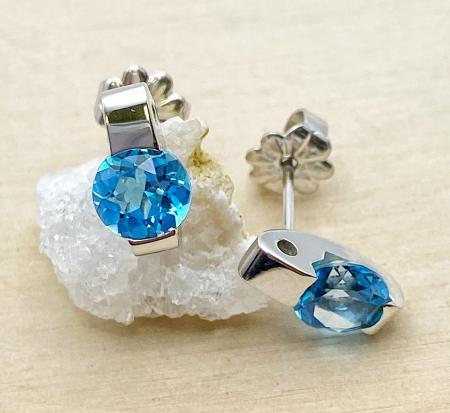 14 karat white gold Swiss blue topaz bar earrings. $435.00