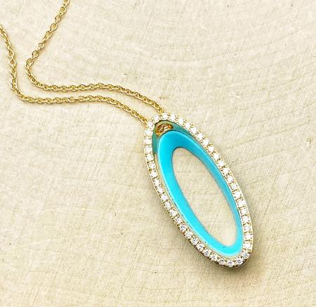 14 karat yellow gold diamond and blue turquoise necklace. $1,380.00