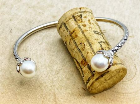 Sterling silver freshwater cultured pearl and diamond cuff bracelet. $400.00