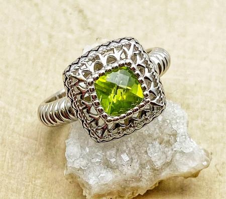 Sterling silver checkerboard cut peridot ring. $150.00