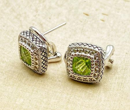 Sterling silver checkerboard cut peridot earrings. $250.00