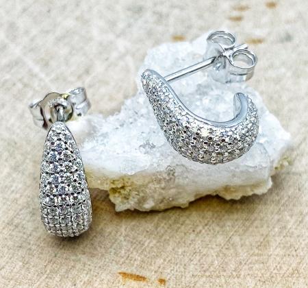 Sterling silver and cubic zirconia "J" hoop earrings. $145.00