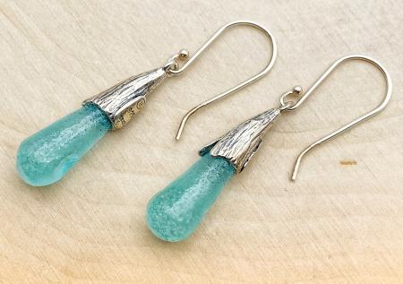 Sterling silver tear drop green Roman glass earrings. $335.00