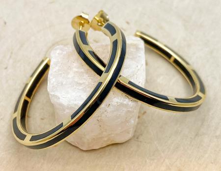 Sterling silver and 14 karat yellow gold vermeil black resin inlay hoop earrings $450.00