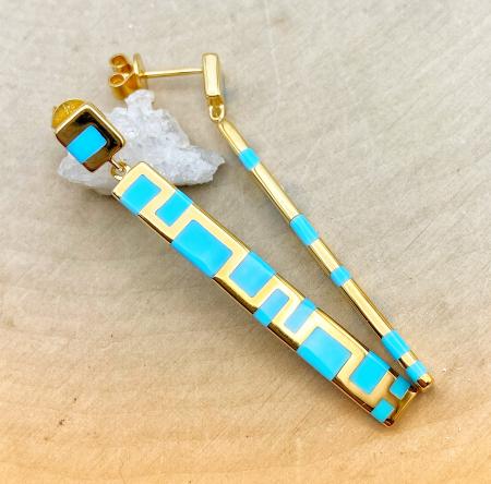 Sterling silver and 14 karat yellow gold vermeil baby blue ceramic inlay earrings. $465.00