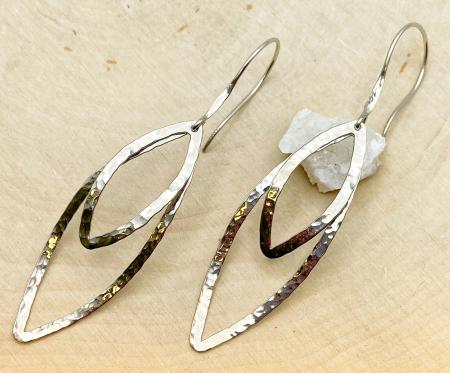 Sterling silver hammered marquise earrings. $105.00