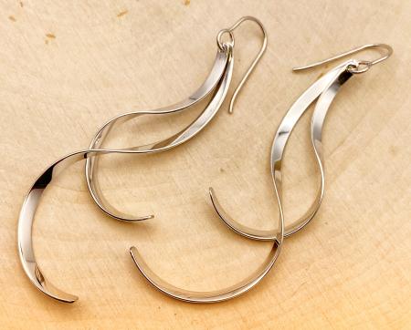 Sterling silver double twist dangle earrings. $110.00