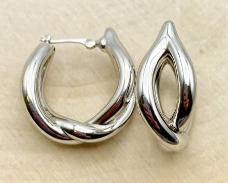 Sterling silver twist hoops. $135.00