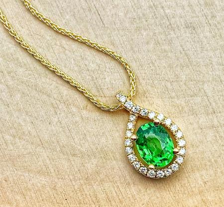 14 karat yellow gold tsavorite garnet and diamond necklace. $2035.00