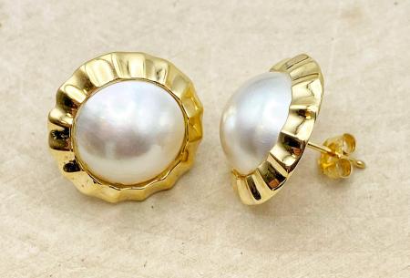 14 karat yellow gold 12mm mabe pearl earrings. $900.00