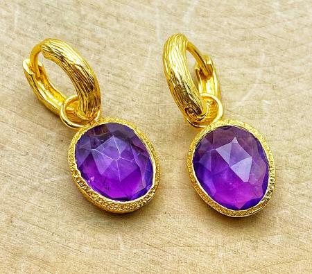 Sterling silver and 18 karat yellow gold vermeil faceted amethyst earrings. $210.00