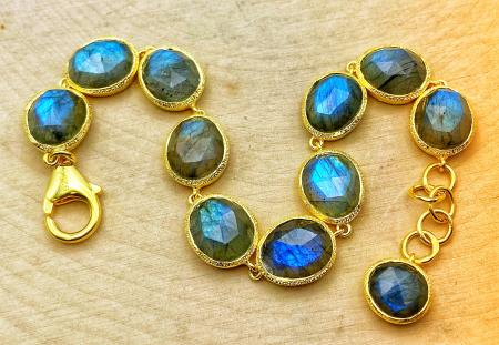 Sterling silver and 18 karat yellow gold vermeil faceted labradorite bracelet. $535.00