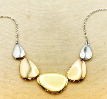 Sterling silver and 18 karat yellow gold vermeil tri-color necklace. $385.00