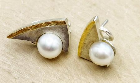 Sterling silver and 18 karat gold button freshwater cultured pearl earrings. $335.00