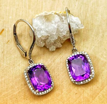 14 karat white gold cushion cut amethyst and diamond earrings. $1295.00