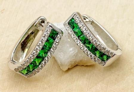 14 karat white gold tsavorite garnet and diamond earrings. $3525.00