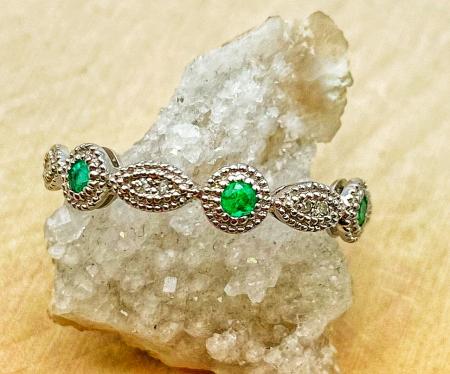 14 karat white gold emerald and diamond ring. $665.00