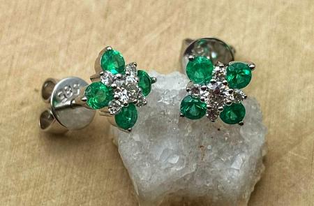 14 karat white gold emerald and diamond earrings. $1600.00