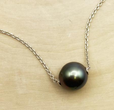 Sterling silver necklace with a 10mm Tahitian cultured pearl. $535.00