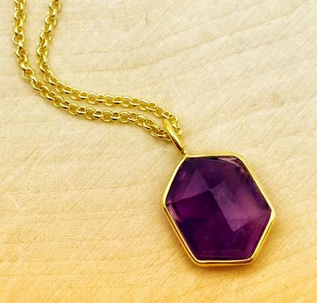 Sterling silver and 18 karat gold vermeil fancy cut amethyst necklace. $155.00
