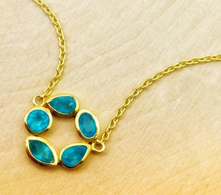Sterling silver and 18 karat gold vermeil multi shaped apatite necklace. $210.00