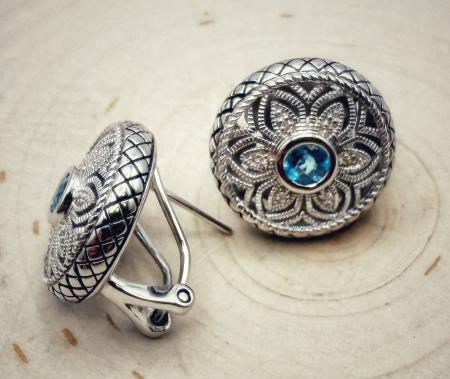 Sterling silver, blue topaz and diamond filigree earrings. $350.00