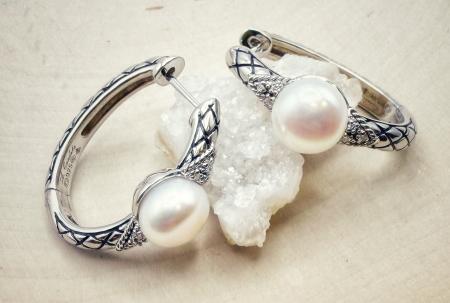 Sterling silver button freshwater pearl and diamond earrings. $275.00