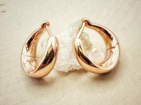Sterling silver and 18 karat rose gold vermeil hoop earrings. $135.00
