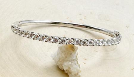 14 karat white gold lab grown diamond bangle bracelet totaling 2.98 carats. $4,995.00