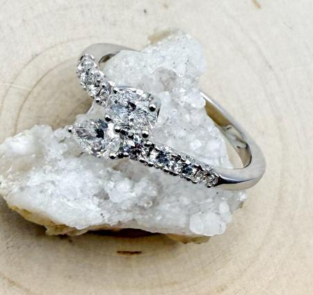 14 karat white gold pear shape, oval and round bypass lab grown diamond ring. $1,575.00