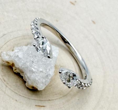 14 karat white gold pear and round brilliant cut lab grown diamond ring. $1,200.00