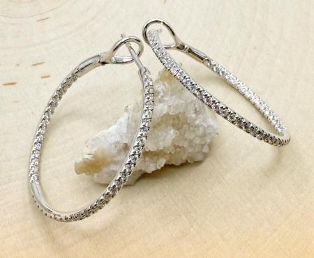 14 karat white gold inside out diamond hoops totaling 0.75 carat. $2010.00