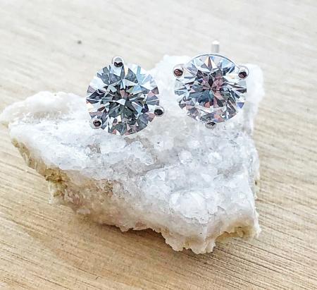 14 karat white gold lab grown diamond stud earrings, 4.10 carats total weight, VVS2 clarity D color. $3378.00