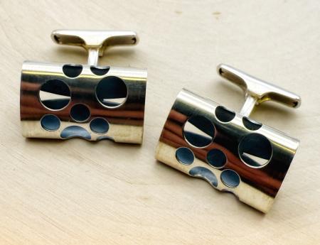 Sterling silver cutout circles cuff links. $175.00