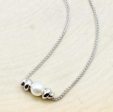 Sterling silver and freshwater cultured pearl "pebble" necklace. $195.00